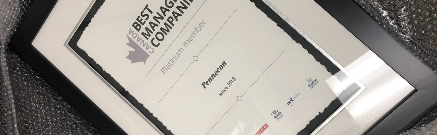 A framed certificate wrapped in bubble wrap, labeled "Canada’s Best Managed Companies," awarded to "Fincoom" as a Platinum member since 2016. Various sponsor logos appear at the bottom.