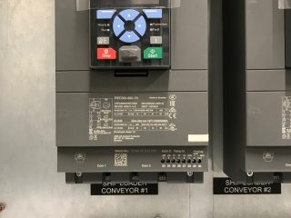 Close-up of an ABB industrial control panel labeled 