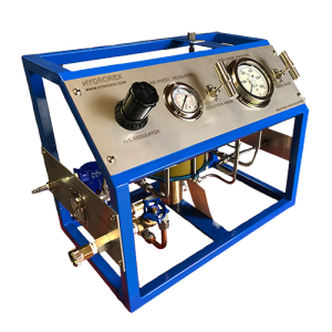 The HYDROTEST PUMP, SINGLE, ANY PRESSURE RATING is a blue metal-framed hydraulic test pump with control knobs, gauges, and labeled indicators on a stainless steel panel for regulating and measuring hydraulic systems.