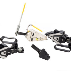 Two black and silver Flange Maintenance Tools, a metal cleat fixture with a yellow handle, and a black rubber piece are arranged on a white background.