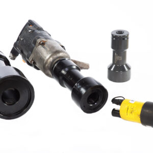 Four Stud Removal Equipment tools of various sizes and shapes are displayed on a white background, featuring a metallic wrench with a black handle and a yellow hydraulic attachment.